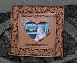 Award album - For 12 X 12 Scrapbook. Heart photo cutout with Swarovski crystal border, hand tooled lettering, floral hand tooled border and hand dyed background.